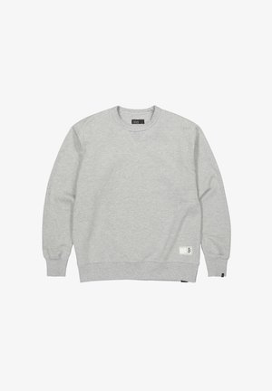 Hellgraues Sweatshirt mit Rundhalsausschnitt, langen Ärmeln, gerippten Bündchen und Saum sowie einem kleinen Markenetikett nahe dem unteren Saum auf der Vorderseite.
