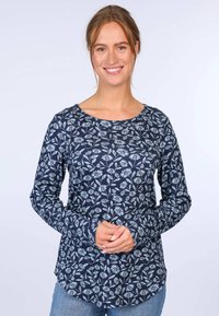 Marineblaues Langarmshirt mit zartem Blumenmuster, rundem Halsausschnitt und tailliertem Schnitt. Weiche Textur mit leicht abgerundetem Saum.