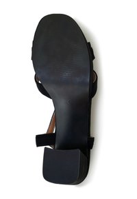 Black high-heeled sandal with a textured rubber sole, suede upper, adjustable strap, and a square heel. Size marked as 40.