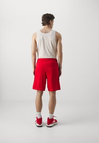 adidas Performance 3 STRIPES SHORT - Sport rövidnadrágok - better scarlet/aurora black
