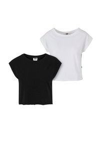 Két rövid ujjú felső: egy fekete és egy fehér, mindkettő pamutból készült, laza szabással és kerek nyakkivágással. Egyszerű dizájn jellemzi.