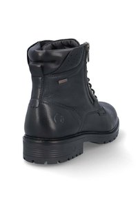 Bottine en cuir noir avec une finition texturée, lacets à l'avant, fermeture éclair sur le côté et semelle en caoutchouc robuste pour la durabilité.