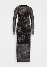 Robe en maille noire à manches longues, ornée d'un motif floral dans des nuances de gris et de marron. Longue jusqu'au sol, avec une silhouette ajustée.