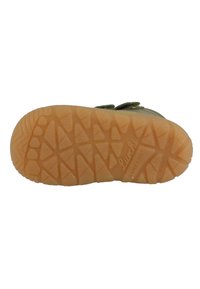 Suola in gomma con un motivo di battistrada testurizzato; presenta un colore marrone chiaro con un logo in rilievo. Adatta per calzature in stile barefoot.
