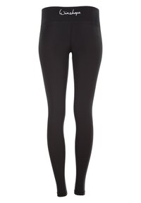 Mustat leggingsit korkealla elastisella vyötäröllä, jossa on valkoinen "Winshape"-logo. Sujuva kangas, todella анfitsdesign, ilman näkyviä kuvioita tai yksityiskohtia.