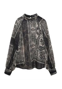 Blusa a maniche lunghe nera e beige con motivo, colletto alto e polsini arricciati, caratterizzata da un design paisley e floreale su un tessuto leggero.