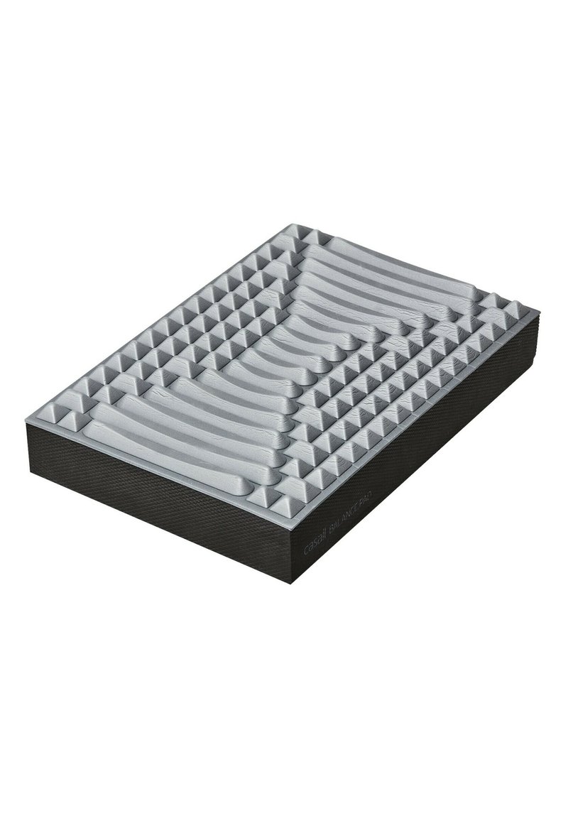 Tapis d'équilibre en mousse grise avec une surface texturée, comportant une série de sections élevées courbées et triangulaires alternées sur une base noire.