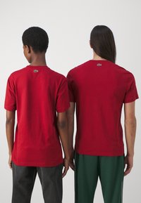 Lacoste UNISEX - Camiseta estampada - ora