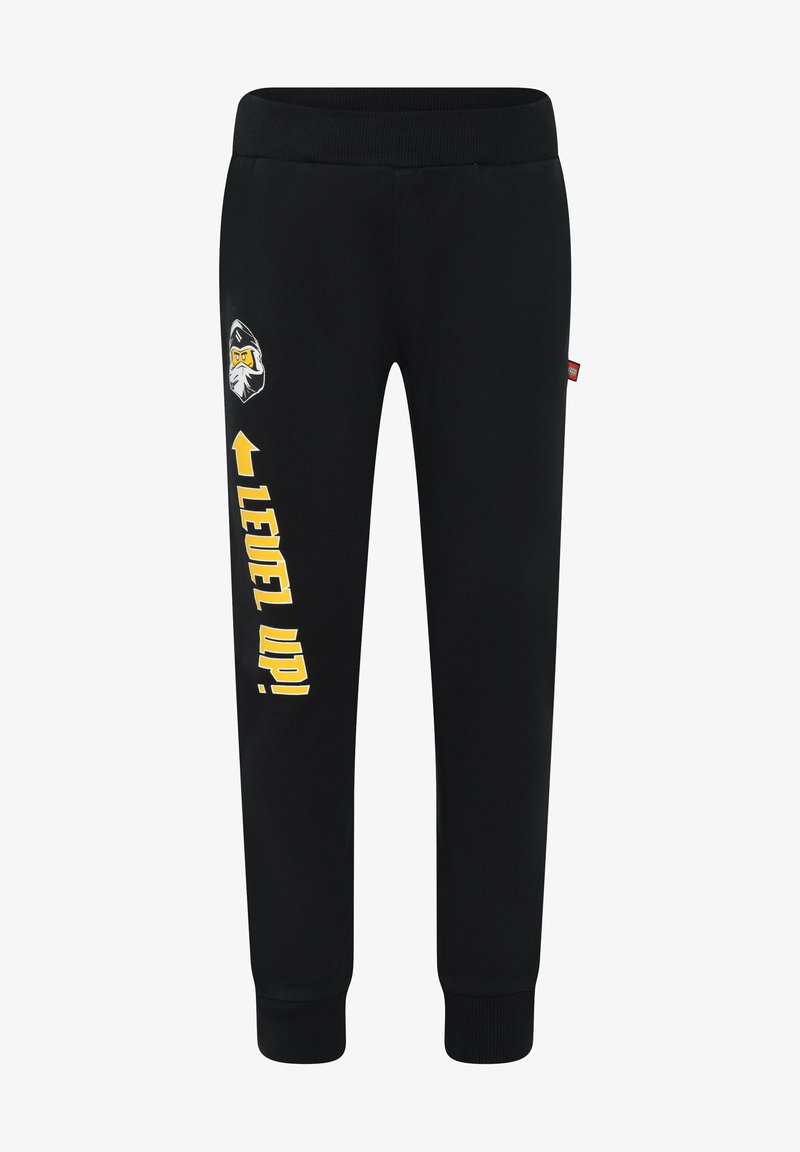 Svarta barnens sweatshirtbyxor med ribbat midjeband och muddar, med texten "LEVEL UP!" i gult och en ninjaansiktsgrafik på vänstra benet.