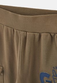 Guess SET  - Tuta - gemustert