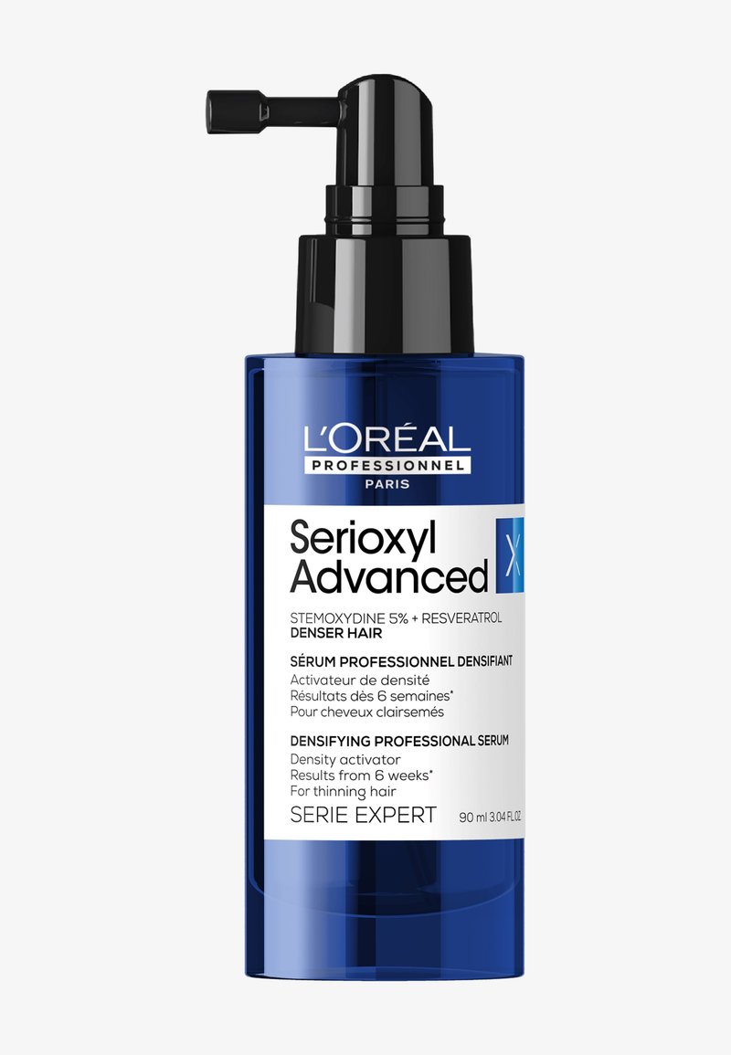 Blauwe pompflacon van L'Oréal Professionnel Serioxyl Advanced verdichtend serum voor dunner wordend haar, 90 ml, met gedetailleerde etikettekst.