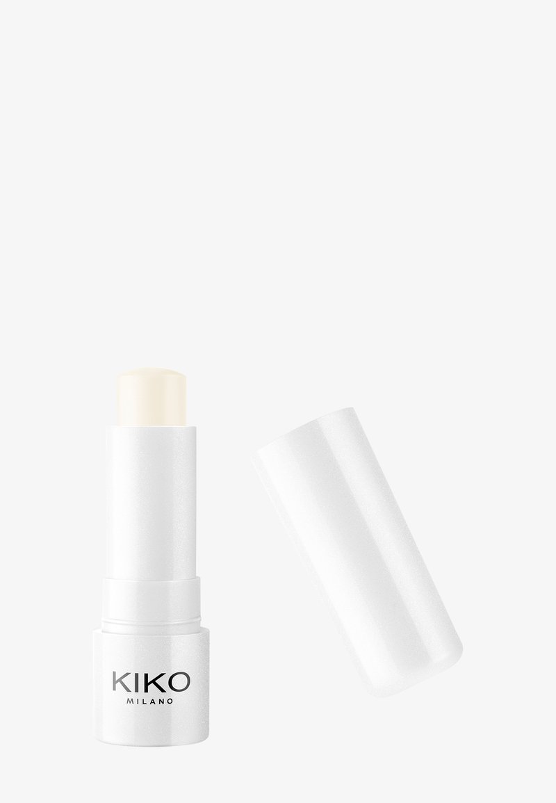 White KIKO Milano lip balm stick with its cap removed, showing the pale balm inside against a plain white background.