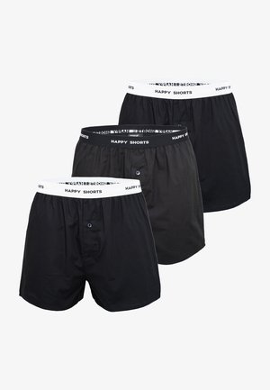 Drie paar boxers gemaakt van een zachte katoenmix. Kleuren zijn zwart en grijs, met een elastische tailleband met het label "HAPPY SHORTS."