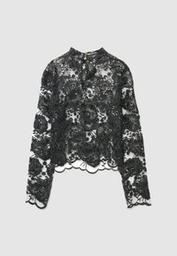Blusa in pizzo nero con maniche lunghe, ricamo floreale, orlo smerlato e collo alto. Presenta dettagli con perline e chiusura posteriore.