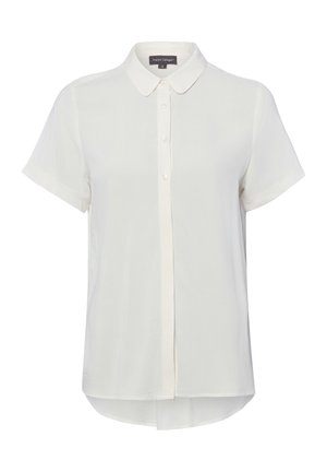 Biała bluzka z krótkim rękawem, ostrokątnym kołnierzem i zapinana z przodu na guziki, nieco dłuższy tylny dół, gładka tkanina.