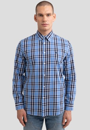 Herren Hemd mit langen Ärmeln in blauem und navy kariertem Muster. Aus Baumwolle, mit standardisiertem Kragen, Frontknöpfen und taillierter Passform.