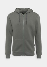 Met capuchon en ritssluiting, sweatshirt in gedempt olijfgroen met voorste kangoeroezakken en een trekkoord in de capuchon.