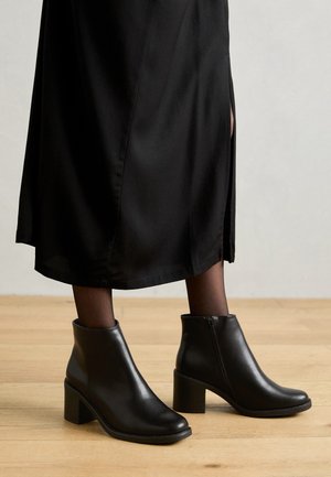 Ankle boots - black