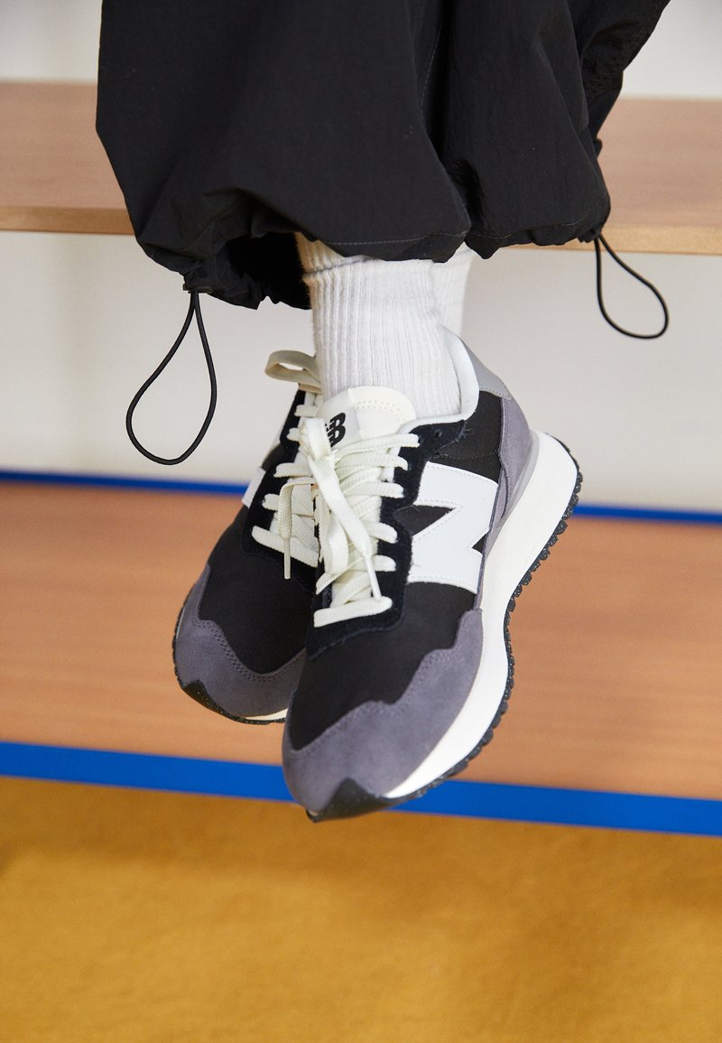 New Balance WS237 - Road running shoes - black magnet/black - Zalando.co.uk