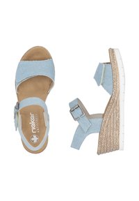 Light blue denim sandals with two wide straps, adjustable buckle, and a woven wedge heel. Soft beige footbed with brand logo.