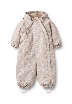 Combinaison de neige bébé rose clair à motifs, avec capuche, poignets élastiques et sangles aux pieds, conçue pour temps froid.