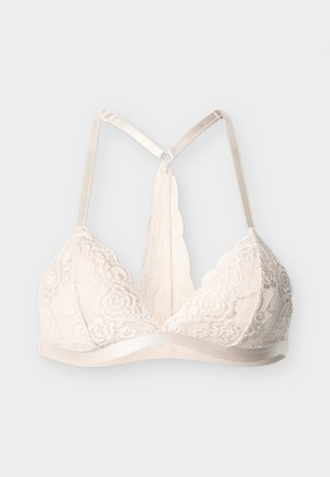 Bralette en dentelle blanche avec fines bretelles réglables et bords festonnés, présentant un dos nageur avec un panneau central en dentelle.