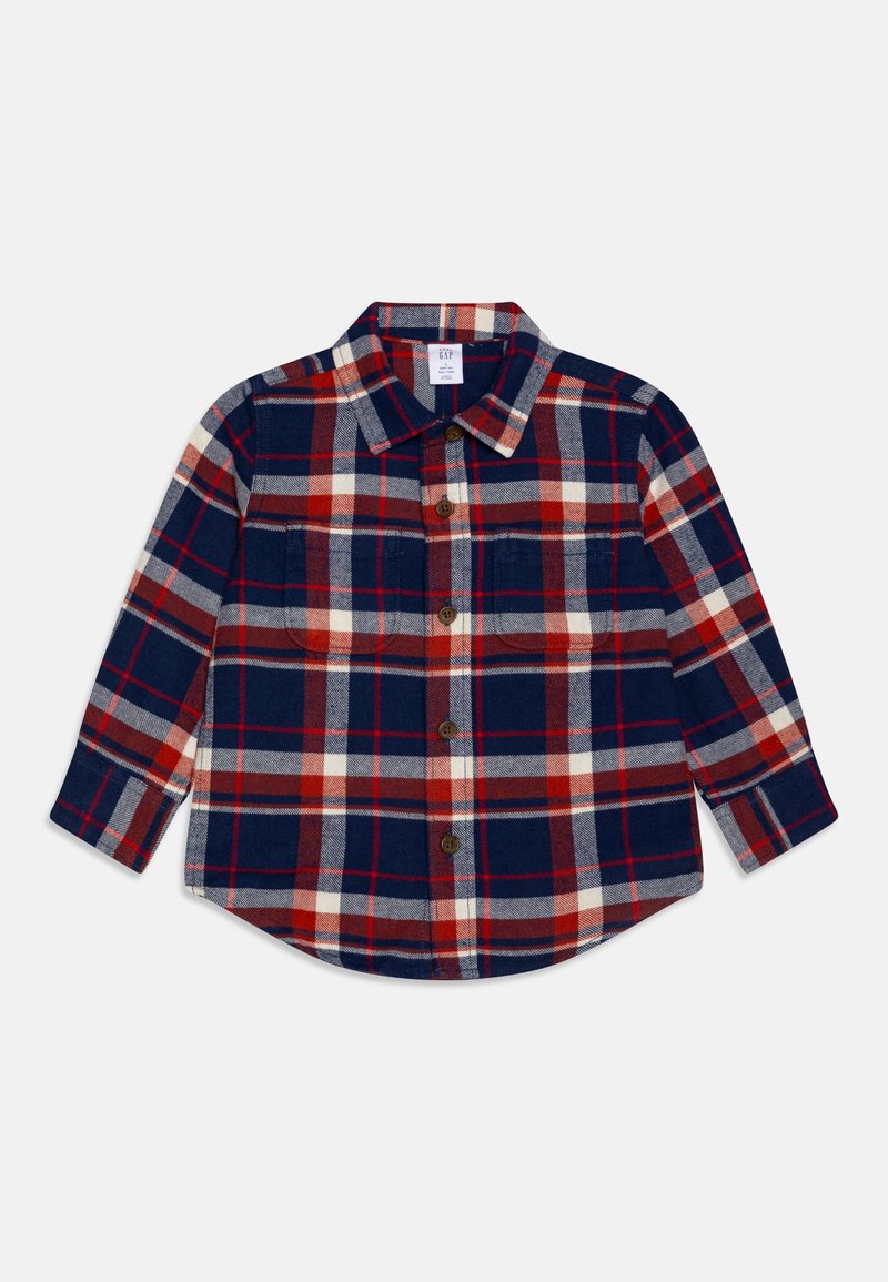Chemise pour enfant à manches longues avec fermeture à boutons, motif à carreaux rouge, marine, gris et blanc, et deux poches poitrine.