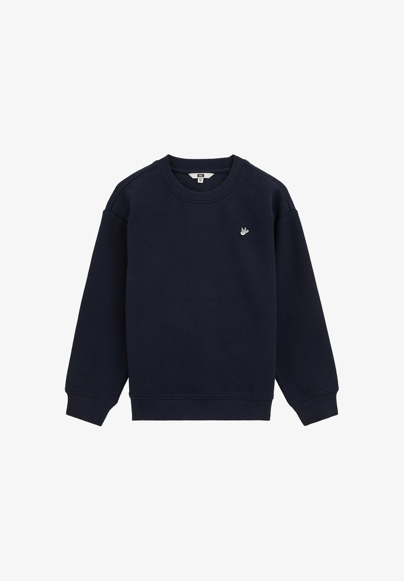 Sweat-shirt bleu marine texturé avec col rond, manches longues et petit logo blanc d'oiseau sur le côté gauche de la poitrine.