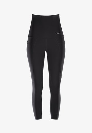Zwart hoge taille leggings van rekbaar materiaal, met zijzakken en gebogen naden voor een aansluitende pasvorm.