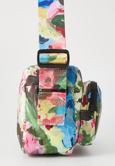 Floral-patterned crossbody bag with a zippered pocket and adjustable strap. Made of durable fabric in vibrant colors: pink, blue, and green.