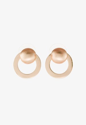 Paire de boucles d’oreilles en métal doré avec un dessus rond en forme de dôme et un anneau circulaire suspendu sous chaque dôme.