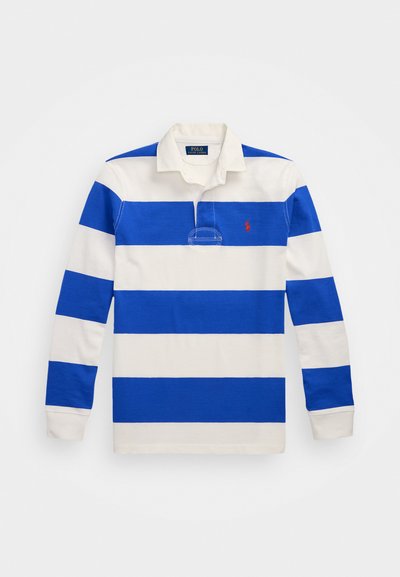 Mėlynos ir baltos juostelės ilgomis rankovėmis polo marškiniai su apykakle, mygtukų plokštelė ir raudonas išsiuvinėtas logotipas ant krūtinės. Minkšta medžiaga.