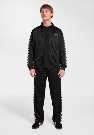Hummel HUMMEL HMLCLUB CHEVRON TRACK TOP - Training jacket - black