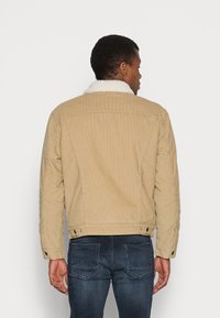 Levi's® TYPE III SHERPA TRUCKER JACKET - Giacca di jeans - beige