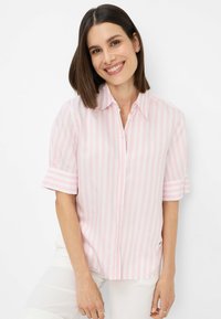 Lightweight, short-sleeve button-up shirt featuring alternating pink and white vertical stripes, with a collar and rolled sleeve cuffs.