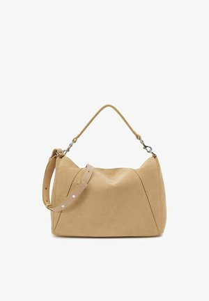 Beige suede shoulder bag with a detachable strap, silver-tone hardware, and soft, rounded rectangular shape.