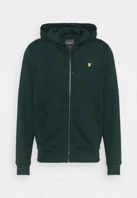 Tmavě zelená mikina na zip z měkké látky. Má kapsu typu klokanka, kapuci se stahovací šňůrkou a malou žlutou značku na prsou.