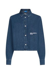 Džinsinė striukė, tamsiai mėlyna, trumpa dizaino, ilgomis rankovėmis su mygtukų švarkais, turi sidabrinius mygtukus ir siuvinėtą "KARL LAGERFELD JEANS" logotipą.