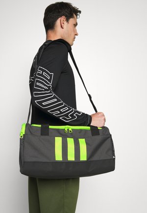 DUFFLE M UNISEX - Sports bag - dough solid grey/black/solar yellow