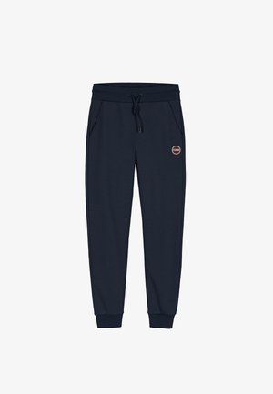 Navy Sweatpants mit elastischem Bund und Kordelzug, ausgestattet mit Seitentaschen und einem runden Logopatch am linken Oberschenkel. Weiche Textur.