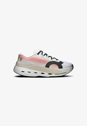 Valge ja roosa gradiendiga jooksujalats mustade paeltega, paksu polsterdusega tallaga ning suure musta ringikujulise logoga küljel.