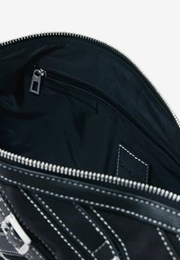 Desigual SMALL WITH BUCKLES - Handtasche - black