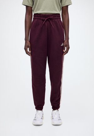 adidas Sportswear, ESSENTIALS 3 STRIPES LOOSE PANTS - Долнище на анцуг - maroon/ivory