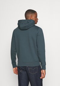Tommy Hilfiger LOGO HOODY - Sweatshirt com capuz - mystic lake