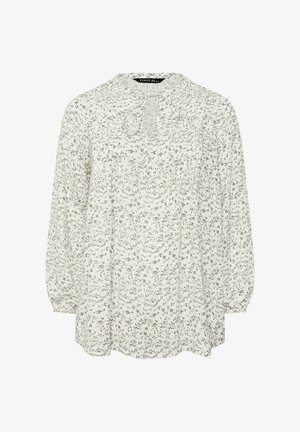 Blusa bianca a maniche lunghe con piccolo motivo floreale nero, scollatura rotonda con apertura a goccia e dettaglio con laccio, e polsini leggermente arricciati.