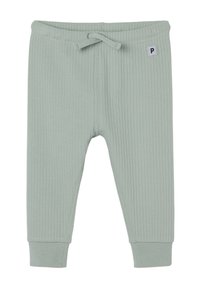Groene geribde joggingbroek van zachte katoen, met een elastische tailleband, trekkoord en aansluitende manchetten. Klein merklabel op de voorkant.