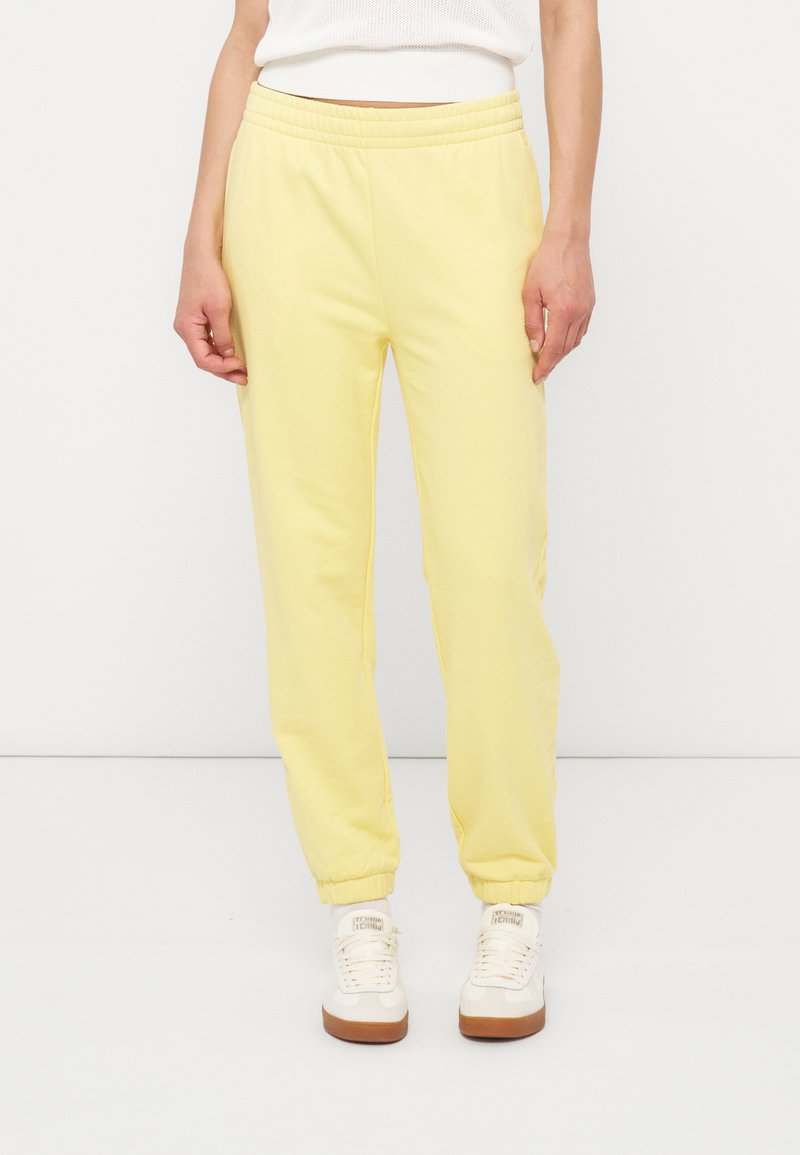 Lacoste Trainingsbroek lichtgeel