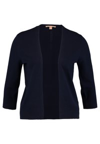 Marinblå cardigan gjord av mjukt stickat material, med öppen front, trekvartslånga ärmar och ribbade fållar.