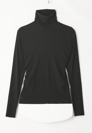Camiseta de manga larga negra con cuello alto, hecha de tela acanalada, con un diseño ajustado y un dobladillo curvado en la parte inferior.