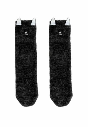 Black cat-themed socks made of soft, plush material. They feature white ear accents and facial design details on the front.